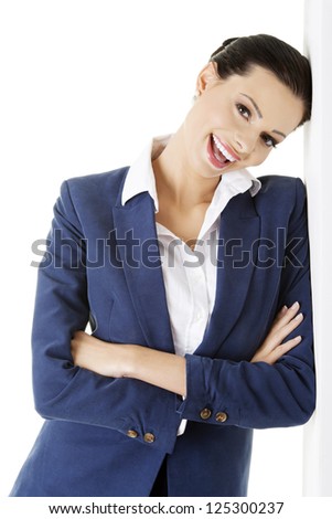 Portrait of young businesswoman or student in elegant clothes