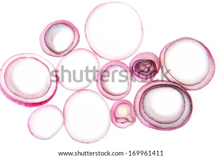 Composition of red onion rings. Isolated on white.