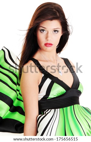 Sexy woman in skirt blown by wind, isolated on white background