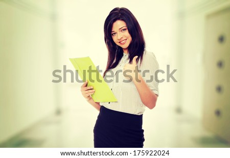 Beautiful smiling woman with thumb up.