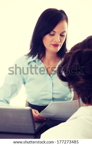 Business coaching concept. Young woman being interviewed for a job.  Isolated on white background