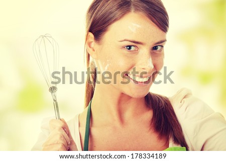 Young beautiful female cook