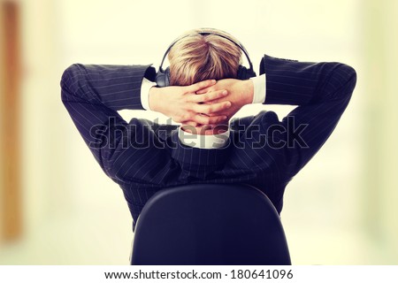 Young businessman relax with music