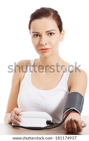 Woman doing blood pressure test