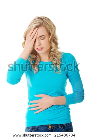 Sick woman about to throw up holding her stomach