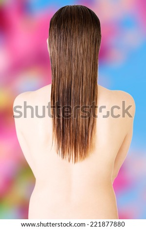 Woman's back. Long hair.Isolated on white. Back view.