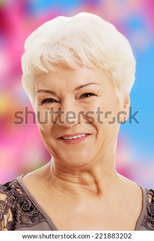 Portrait of an old, smiling woman