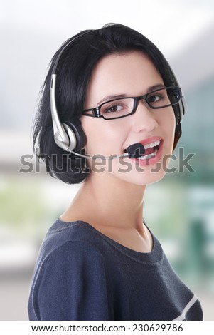 Closeup of attractive customer support representative smiling