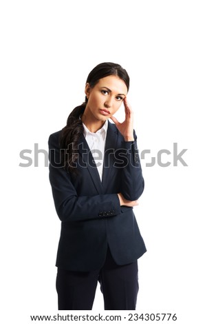 Businesswoman tired because of troubles looking at the camera.