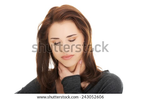 Charming young woman with terrible throat pain.
