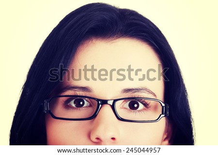 Female\'s face with eyeglasses. Cut out.
