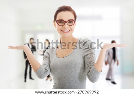 Happy woman showing her empty hands.
