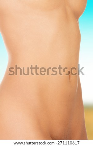 Beautiful slim female naked belly.