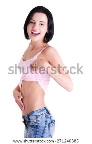 Closeup on fitness woman showing flat belly.