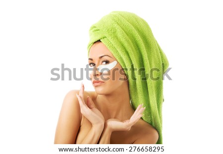 Spa serene woman with gel eye mask