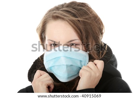 A model wearing a mask to prevent \'Swine Flu\' infection. Isolated