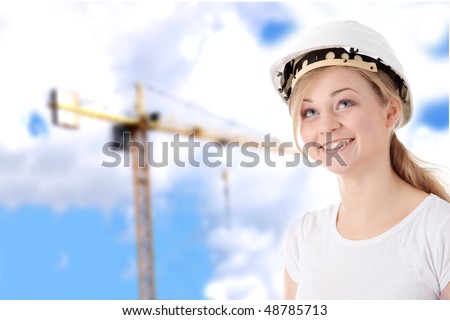 Young architect woman in white helmet