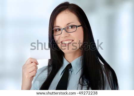 Young business woman with business card