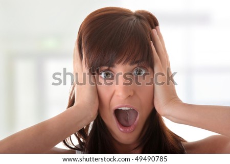 Young woman portrait - with face expression - scared