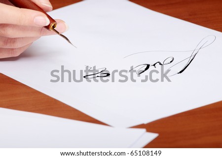 Beautiful woman writing a love letter with old calligraphy pen and ink