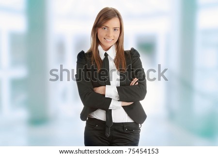 Confident businesswoman standing wearing elegant clothes
