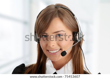 Beautiful Call Center Woman Wearing A Telephone Headset, isolated on white background