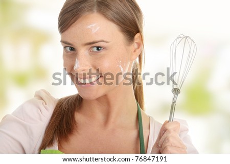 Young beautiful female cook