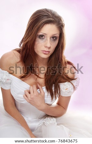 Beautiful young caucasian sad bride crying