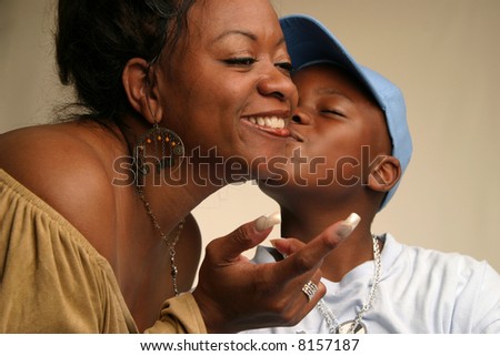 Black mother and son interacting