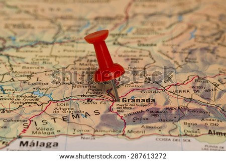 Granada marked with red pushpin on map. Selected focus on Granada and pushpin. Pushpin is in an angle.