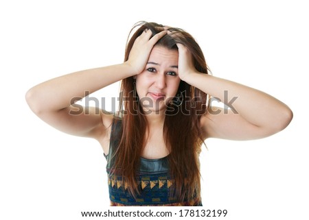 A sad and stressed mixed race college student.  Shot on white background.