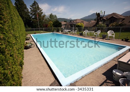 Backyard pool in wealthy estate