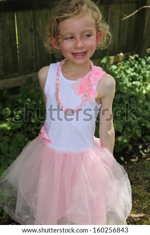 Pretty girl in a ballet dress.
