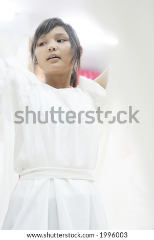 Woman performs as an angel in a religious play at the Thai Korean Christian Education Center in Chiang Rai, northern Thailand.
