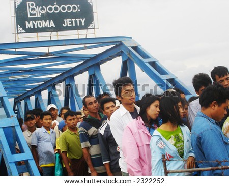 People crossing the border to go into Myanmar (formerly Burma) - EDITORIAL
