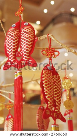 Chinese decorations hanging on a tree - travel and tourism