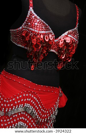 Sexy red sequined belly dancing costume.