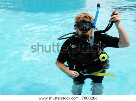 Scuba diver in the swimming pool.