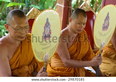 KOH LANTA - DECEMBER 2: Monks chant during a religious ceremony on December 2, 2008 in Koh Lanta, Thailand.