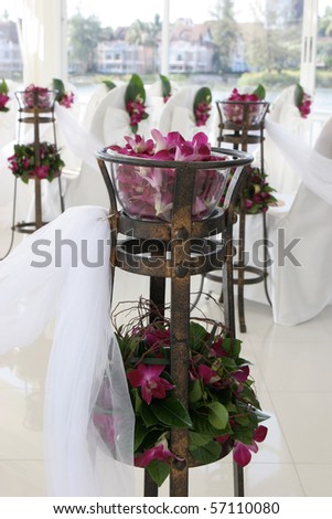 White wedding chapel decorated with beautiful flowers.