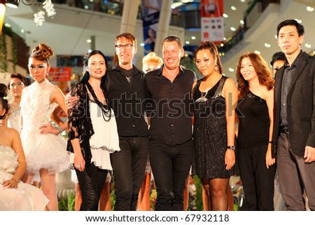 PHUKET - DECEMBER 27: The Make Up Store owner Mika Liias with models and MUAs at The Make Up Store\'s Frozen Diamonds Fashion Show on December 27, 2010 in Phuket, Thailand.