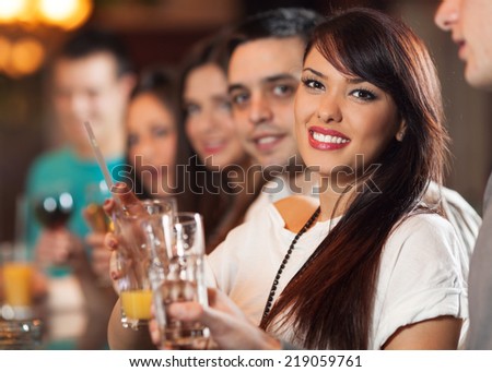 Group of friends in a bar