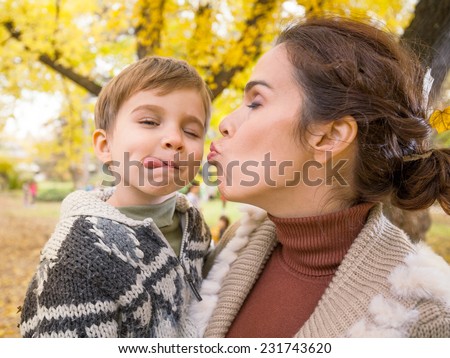 Mother and son making faces
