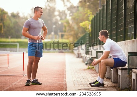 Two young men before or after sport training
