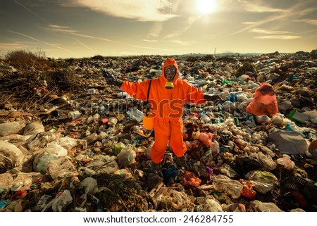 Sanitation worker working on the landfill