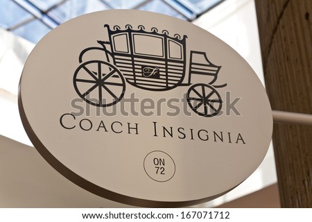 Detroit, Michigan, July 2013. GM Renaissance Center, Coach Insignia sign.
