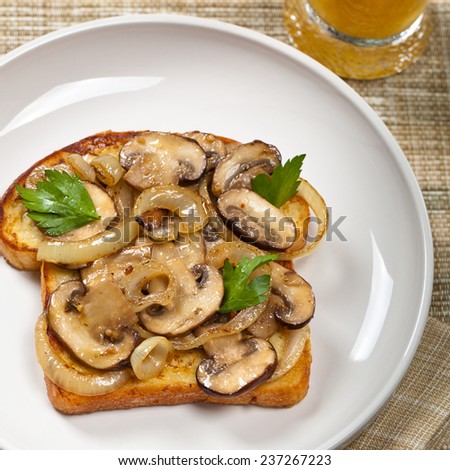 French Toast with mushrooms and onions. Selective focus.