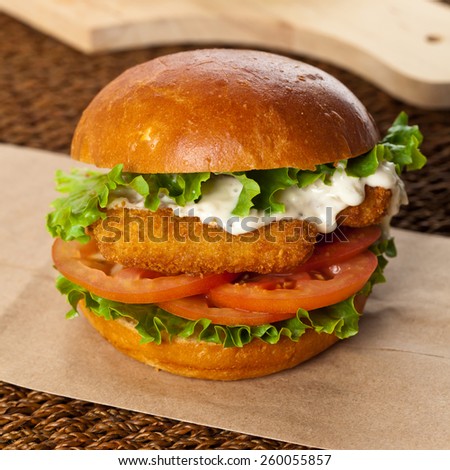 Breaded Fish burger. Selective focus.