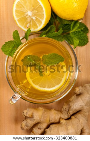 Ginger tea. Ginger, lemon, mint leaves. Selective focus.