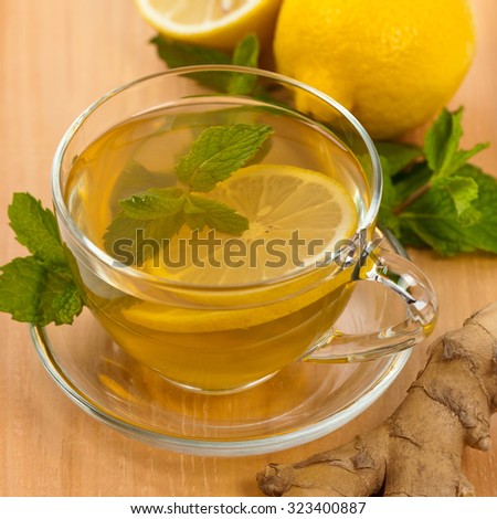 Ginger tea. Ginger, lemon, mint leaves. Selective focus.